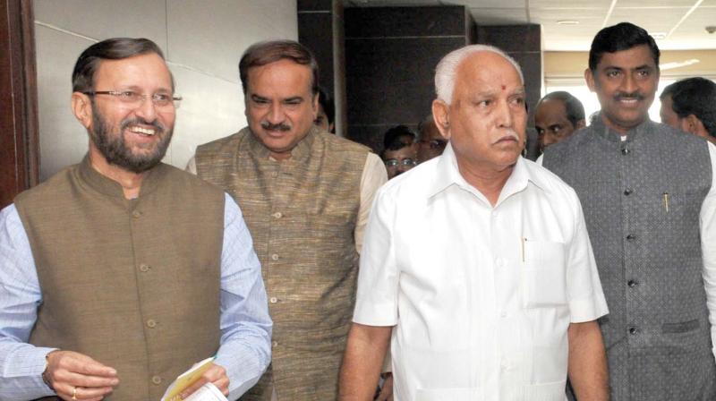 Karnataka BJP in-charge and Union Minister Prakash Javadekar, BJP state president B.S. Yeddyurappa and Union Minister Ananth Kumar at a party meeting in Bengaluru on Friday.