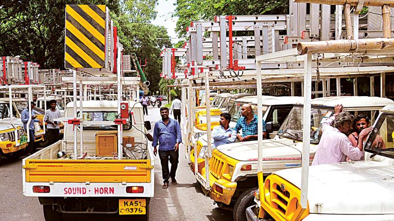 Street light repair vans of BBMP seen parked at BBMP office in Bengaluru on Wednesday   (Image: DC)