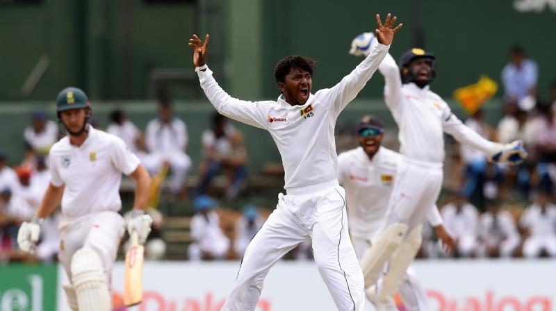 Dananjaya can apply for a re-assessment after modifying his bowling action in accordance with clause 4.5 of the Regulations. (Photo: AFP)