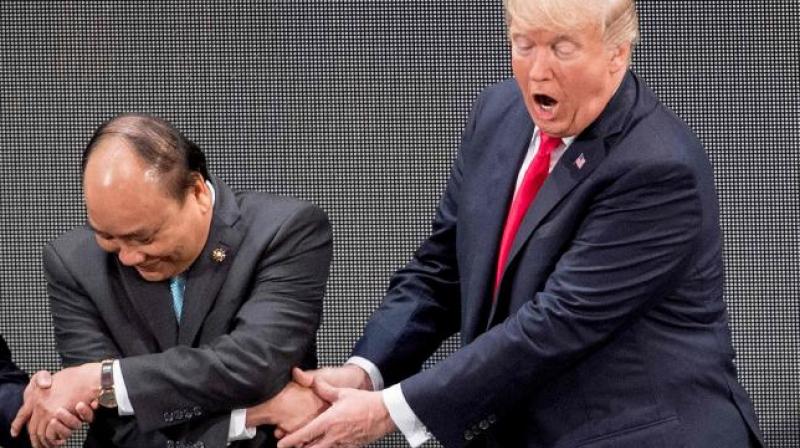 After an awkward few seconds, Trump appeared to recognise his error and made the link between Nguyen and Duterte. (Photo: AFP)
