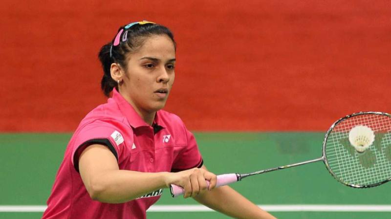 It was Saina who took the first game 21-12, but Okuhara came back from behind to complete a sensational victory and advance to the final.(Photo: AFP)