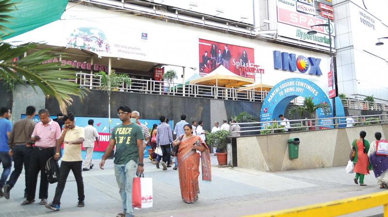 Shoppers at the Mantri Mall at Malleswaram after its opening on Saturday.