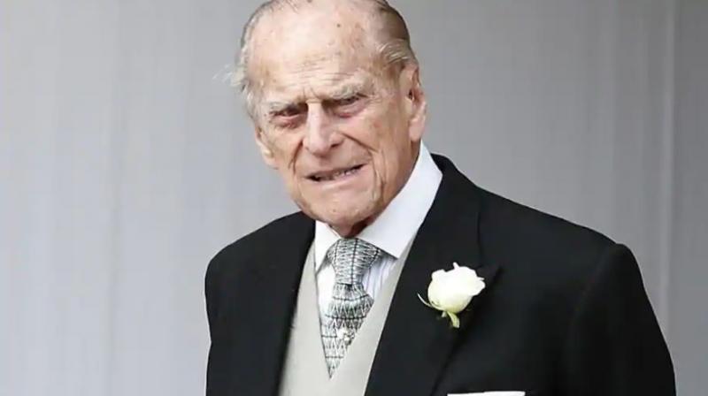 Britains Prince Philip, 97, escapes unhurt from car crash