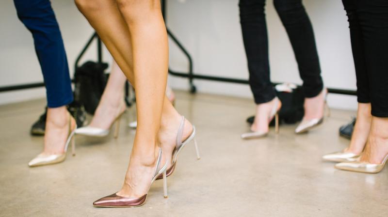 UK lawmakers debate banning mandatory high heels at workplace