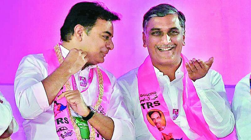 IT and municipal administration minister K.T. Rama Rao  with minister for irrigation, marketing & legislative affairs, T. Harish Rao, at Kompally on Friday. (Photo: P. Surendra)