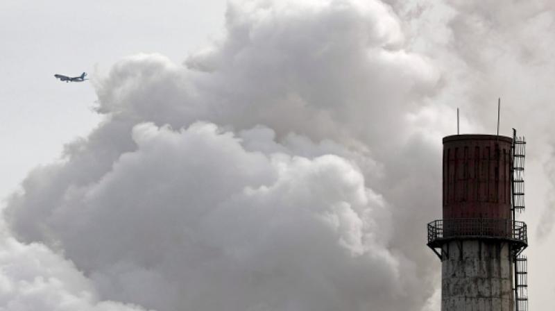 The 2017 estimate comes to on average of 2.57 million pounds (1.16 million kilograms) of carbon dioxide spewing into the air every second. (Photo: AP)