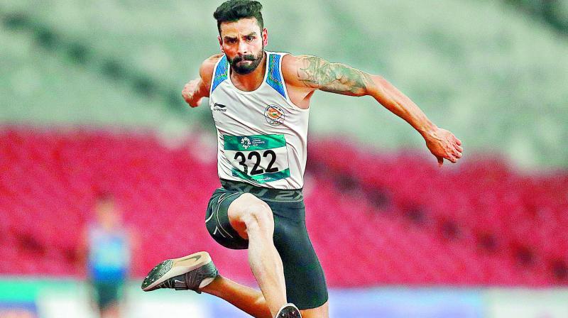 Arpinder Singh competes in the mens triple jump finals in Jakarta on Wednesday.  (Photo:AP)