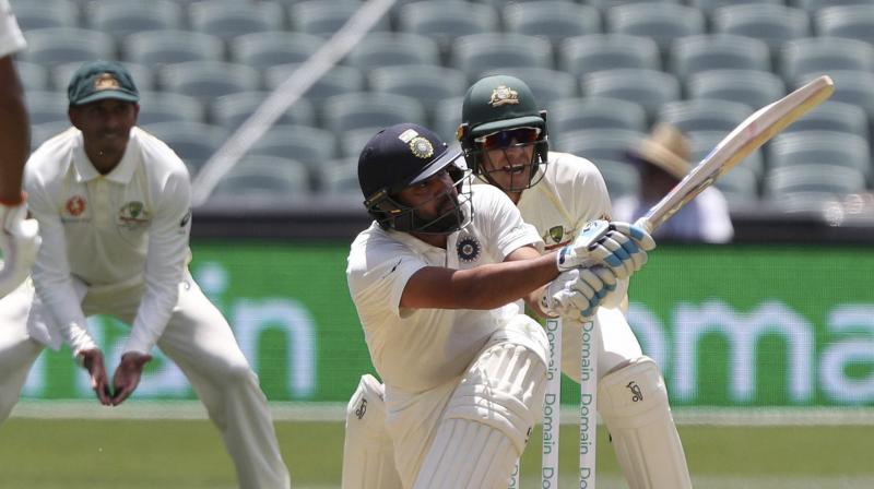 While Pujara was sedate at one end, Rohit took the lead in scoring as he hit sixes at will. (Photo: AP)