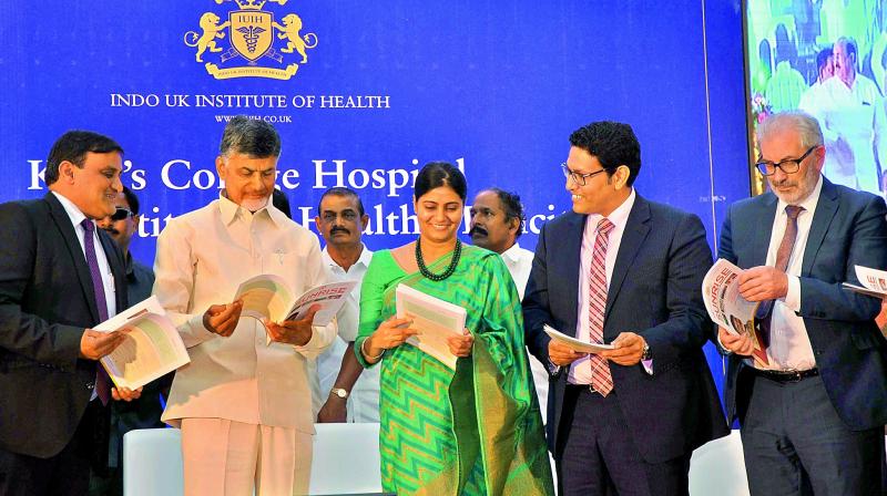 Chief Minister N. Chandrababu Naidu, Anupriya Patel, Minister for Health and Family welfare, Dr. Ajay Rajan Gupta, CEO and MD, Indo-UK Institute release a book during the foundation ceremony.