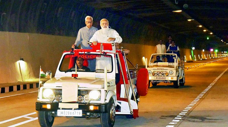 Prime Minister Narendra Modi takes a ride after inaugurating the Chenani-Nashri Tunnel, in Chenani (J&K) on Sunday. (Photo: PTI)