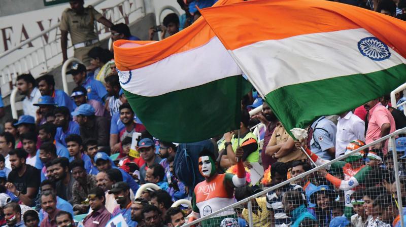 Cricket fans enjoy the India-West Indies fifth  and final one-day match at the Sports Hub stadium at Karyavattom in Thiruvananthapuram on Thursday . A.V. MUZAFAR
