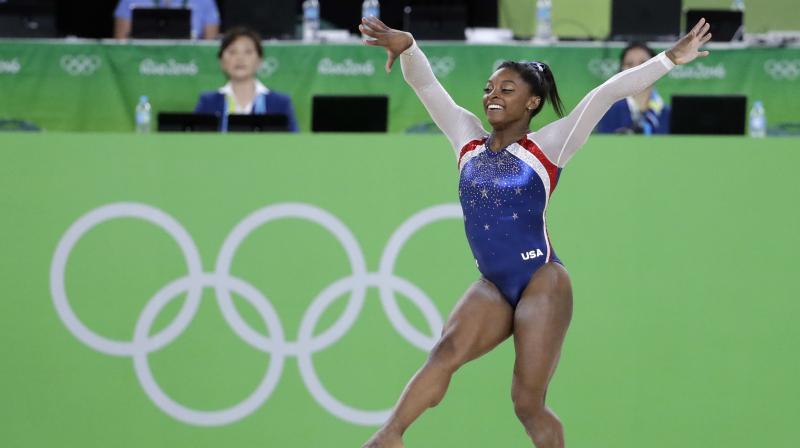 Simone Biles teammates Aly Raisman, McKayla Maroney and Gabby Douglas are among the members of USA Gymnastics squads who have said they were sexually assaulted by Larry Nassar. (Photo: AP)