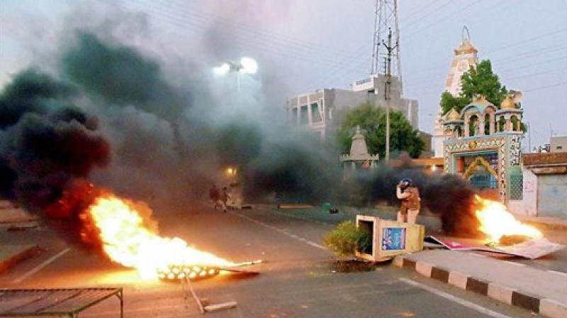 A scene after violent clashes between farmers and the police at Pipliya in Mandsaur district of MP on Tuesday. At least five farmers were killed and four others injured in firing by police on farmers, who have been protesting for a week demanding loan waiver and fair price for their produce. (Source: PTI)