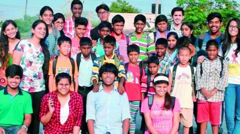 Sidharth with his group members at an orphanage.