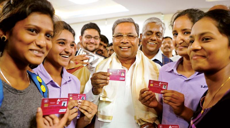 CM Siddaramaiah inaugurates the Bengaluru Metropolitan Transport Corporation Smart Card at Kempegowda Bus Station at Majestic, in Bengaluru on Saturday  R Samuel