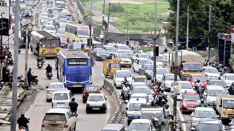Heavy traffic jams were a common sight on Monday due to the Bharat Bandh called to protest the hike in fuel rates. (Photo: P. Surendra)