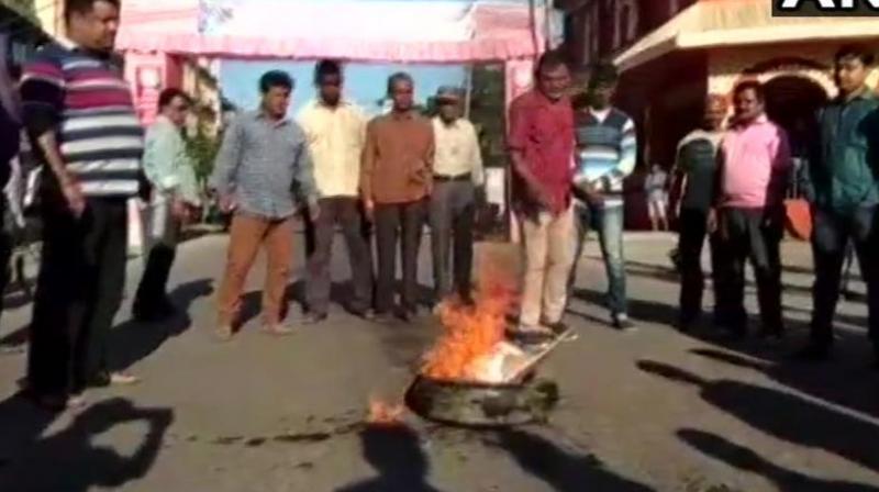 All Assam Bengali Youth Students Federation has called a 12-hour shutdown in Tinsukia in protest against the murder of 5 people killed by ULFA terrorists in Bishnoimukh village. (Photo: Twitter | ANI)