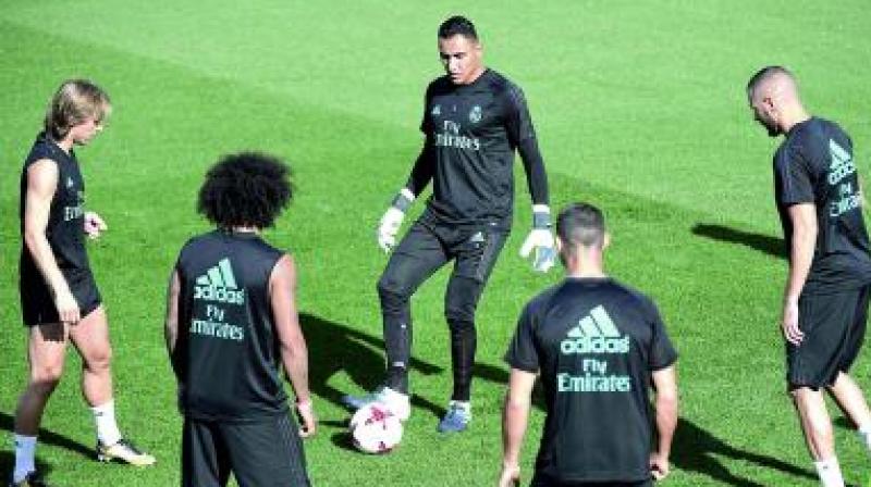 Real Madrid players at a training session in Madrid on Tuesday, the eve of their Spanish Super Cup second leg match against Barcelona. (Photo: AFP)