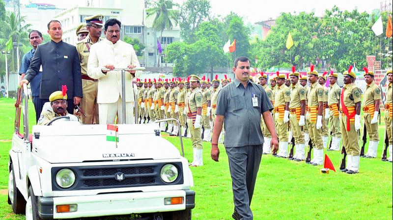 Deputy Chief Minister N. Chinna Rajappa reviews the Parade by police personnel at the 71st Independence Day celebrations organised by district administration at Police Barracks Stadium in Visakhapatnam on Tuesday. (Photo: DC)