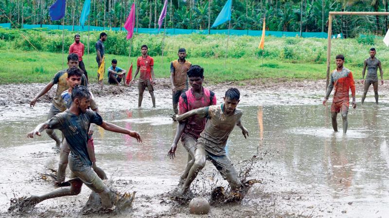 A scene from the mud-football competitions held in connection with Splash, the Wayanad Monsoon Carnival, at Kakkavayal near Kalpetta on Thursday.