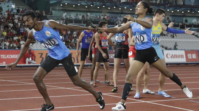 The Indian quartet of Mohd. Anas, Poovamma, Hima and Arokia Rajiv clocked 3 minute and 15.71 seconds to finish behind Bahrain (3:11.89) in the event which was making a debut in the Asian Games. (Photo: AP)