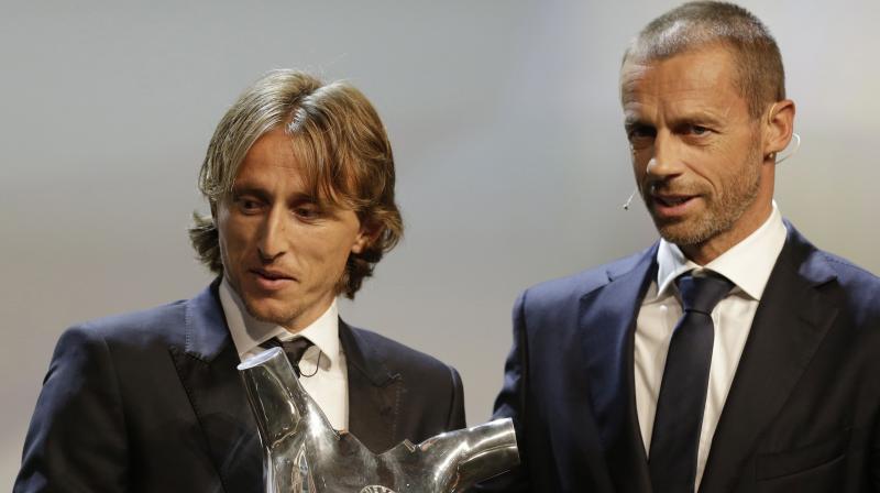 Real Madrids achievement in winning the Champions League for the third season running was further recognised as Modric also won the UEFA award for the best midfielder of last season. (Photo: AP)