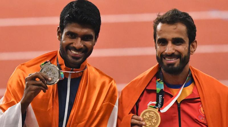 The two gold, a silver from 4x400m mens relay team and a bronze each from discus thrower Seema Punia and 1500m runner P U Chitra on Thursday took Indias medal tally from athletics to 19 (7 gold, 10 silver, two bronze). (Photo: AFP)