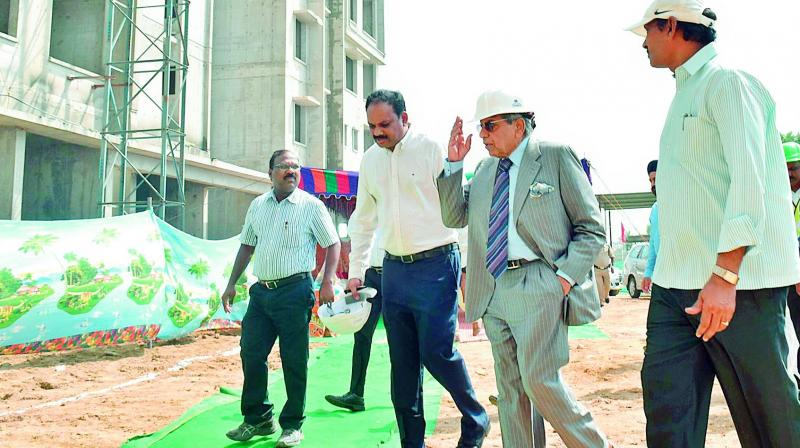 15th Finance Commission chairman N.K. Singh and his team members visit the housing complexes in the capital region along with APCRDA commissioner Ch. Sreedhar on Friday. 	 (DC)