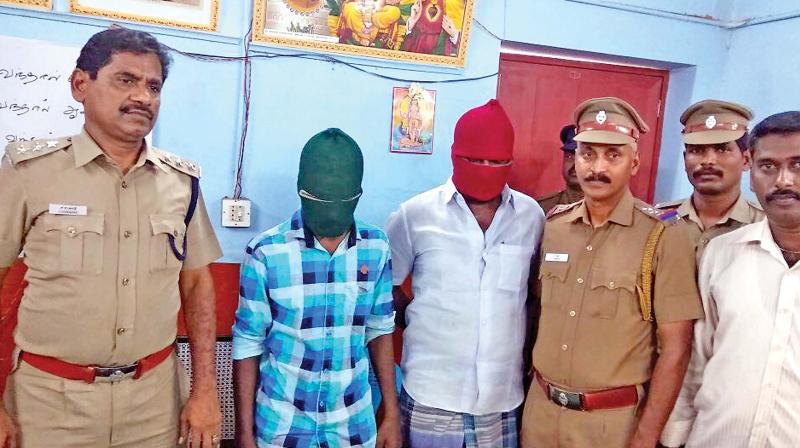 Tiruporur police team with two of the accused secured from a hideout in Mannargudi. (\Photo: DC)