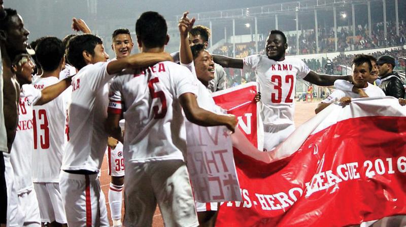 Aizawl FC players celebrate after winning the I-League