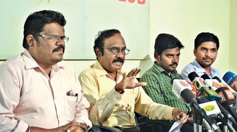 Secretary of Doctors Association for Social Equality, Dr G R Ravindranath talks to the press on the occasion of the formation of the Joint Action Committee on Friday. (Photo: DC)