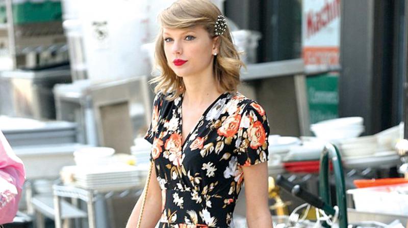Taylor Swift and her ever dying love for vintage floral dresses.