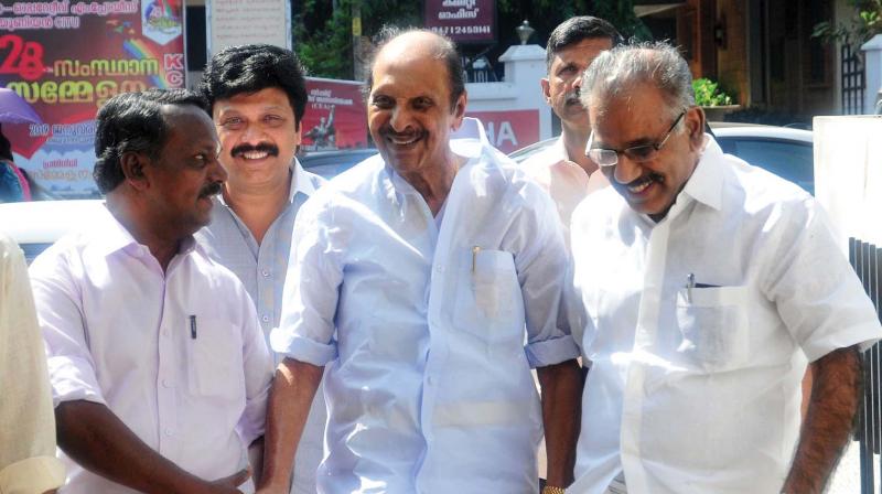 Kerala Congress (B)  chairman R.Balakrishna Pillai and his son K.B.Ganesh Kumar, MLA, arrive at the AKG Centre to attend the first LDF meeting after the inclusion of their party in the ruling front, in Thiruvananthapuram on Thursday . Transport Minister A.K. Saseendran is also seen . (DC)