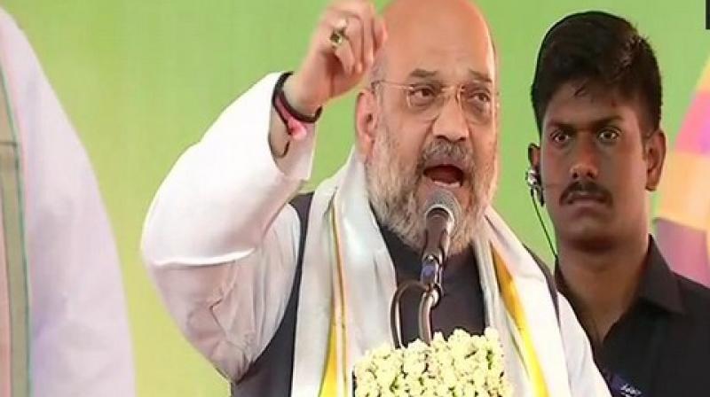 Those who were involved in the 2G scam, AgustaWestland helicopter scam, and Coal scam cant work for development of people, said Amit Shah at the rally in Ramanathapuram. (Photo: ANI).