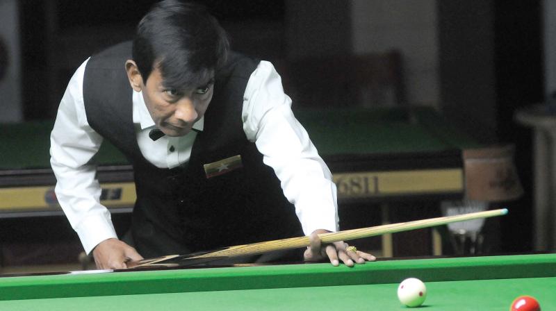 Aung Htay in action during the quarterfinals in Bengaluru on Sunday. (Photo: SHASHIDHAR.B)