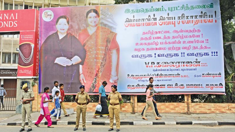 A huge hoarding requesting Sasikala to take over the leadership of AIADMK by ex-MLA and South Chennai district secretary V.P. Kalairajan on Dr R.K. Salai in Chennai. (Photo: DC)