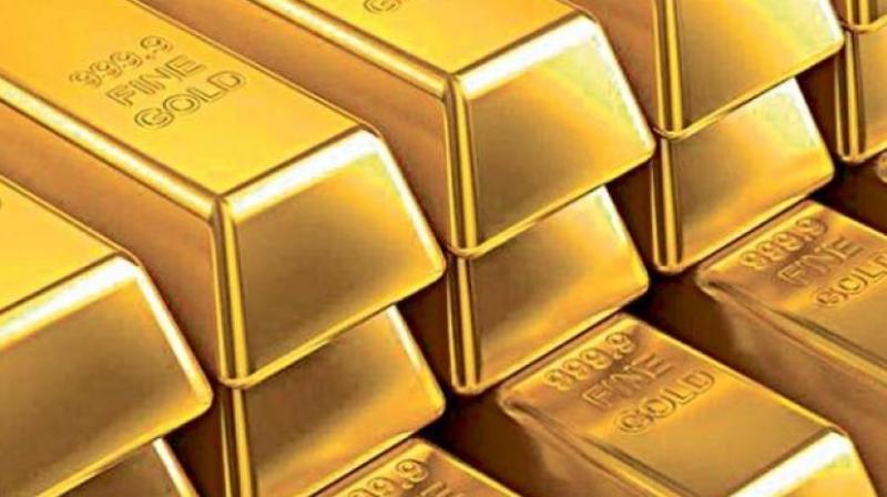 US gold futures rose 0.33 per cent to USD 1,228.00 an ounce, silver rose 0.36 per cent to USD 17.03 an ounce.