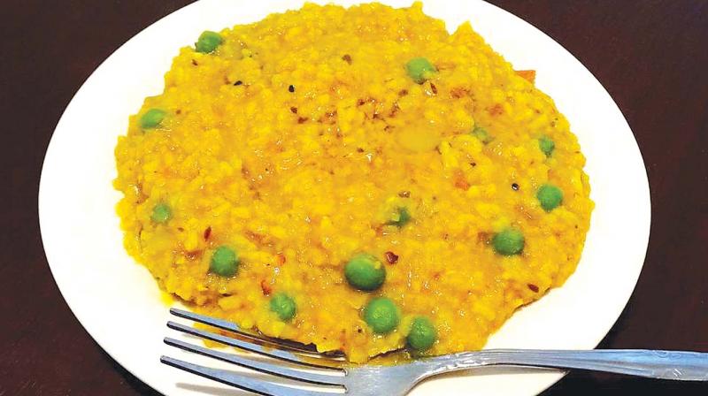 Khichdi  prepared with rice, pulses, coarse cereals and spices  has been picked as it symbolises the countrys unity in diversity, Food Processing Ministry officials said.