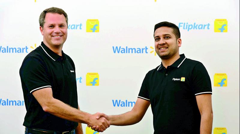 Walmart CEO Doug McMillon with Flipkart Co-Founder and CEO Binny Bansal in Bengaluru on Wednesday.