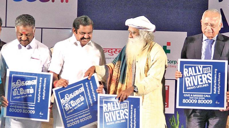 Chief Minister Edappadi K. Palaniswami is joined by Deputy CM O. Panneerselvam in pledging support to Isha Foundations Rally for Rivers project. Spiritual leader Sadhguru Jaggi Vasudev and Apollo Hospitals Chairman Dr Prathap C. Reddy are also seen (Photo: DC)