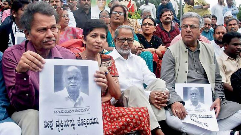 The late Gauri Lankesh(circled) who was murdered at her house on September 5, seen in this file picture with award winner Girish Karnad, and writers K. Marulasiddappa, Bargur Ramachandrappa when they mourned the death of renowned Kannada rationalist  Dr MM Kalburgi, in Bengaluru.