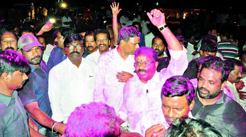 TRS MLC Palla Rajeshwar and MLA Puvvada Ajay Kumar celebrate TBGKS victory in Yellandu on Thursday. (Photo: Deccan Chronicle)