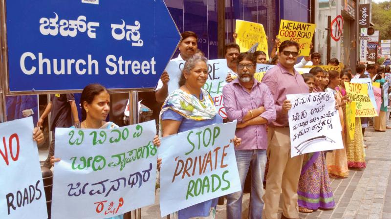 Members of the Forum for Urban Governance and Commons stage a protest against privatisation of Church Street in Bengaluru on Friday   (Image: KPN)