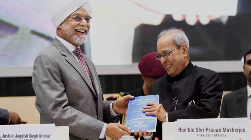 President Pranab Mukherjee with Chief Justice of India JS Khehar during the inauguration of All India Seminar being organized by the Confederation of Indian Bar, at Vigyan Bhavan in New Delhi. (Photo: PTI)