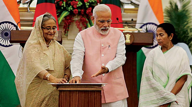 The presence of Prime Minister Narendra Modis political foe Mamata Banerjee was keenly watched. When the Bengal CM was asked to join him and Bangladeshi Prime Minister Sheikh Hasina on the dais, she was a little hesitant. But Modi motioned that she come forward so that the three leaders could stand together. And Mamata promptly did so.