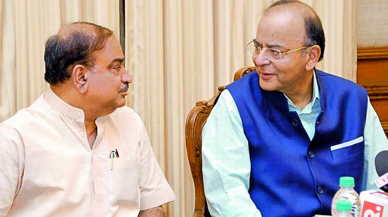 Union finance minister Arun Jaitley with Minister for parliamentary affairs Ananth Kumar addresses the media regarding GST in New Delhi on Tuesday. (Photo: AP)