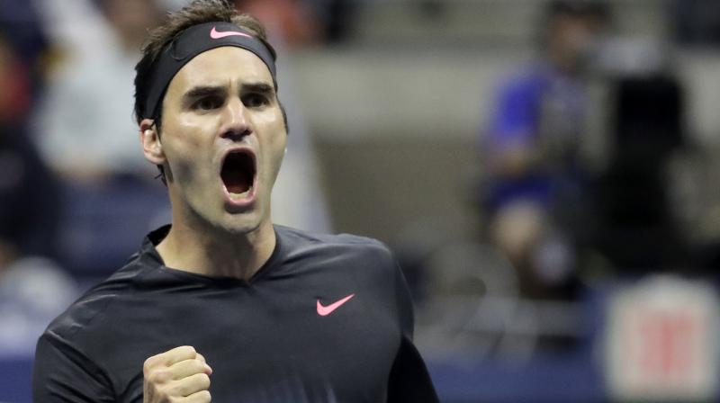 Roger Federer, chasing his third major of the year and 20th of his career, prevailed 4-6, 6-2, 6-1, 1-6, 6-4 to avoid losing in the first round of a Slam for the first time since the 2003 French Open. (Photo: AP)