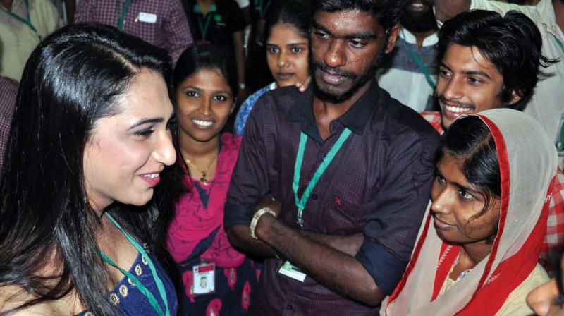 Actor Anjali Ameer interacts with youngsters after inaugurating the short-film fest organised by Oriental Film Society in Kozhikode on Thursday. (Photo: DC)