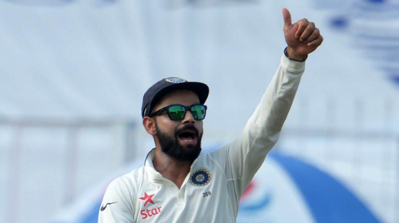 Former England skipper Nasser Hussain has come out in Virat Kohlis support after a British daily claimed that the Indian Test skipper was involved in ball tampering. (Photo: AFP)