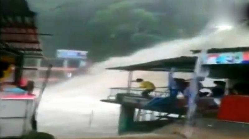 Police helped rescue tourists. Water even surged into shops in the area. (Photo: Screengrab | ANI)